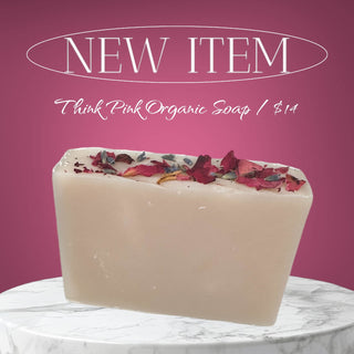 New items - Think Pink Organic Soap unwrapped with dried flowers on top and $14 price per bars