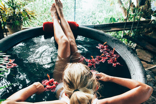 Woman Relaxing in Bathtub